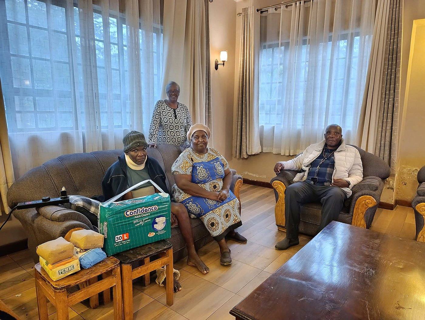 Handing over donated supplies to the community